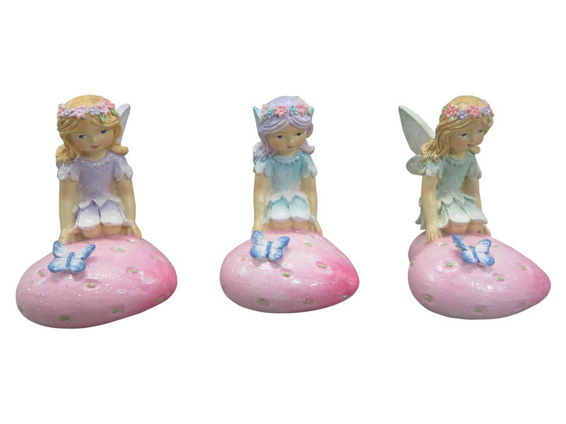 KNEELING FAIRY ON STRAWBERRY