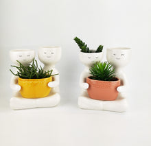 Load image into Gallery viewer, Friends holding a pot Planter Mustard Lg 21cm H21x20x12cm
